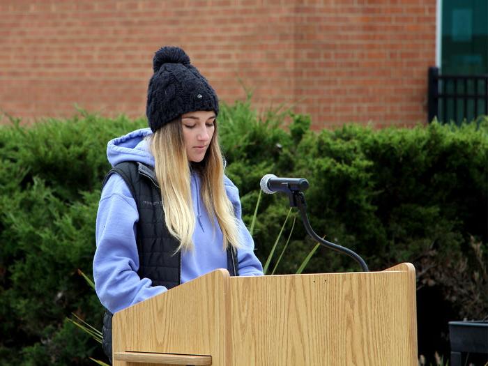 Third year student Lilia Lion reads a testimonial and shares her thoughts during the victimology event at Penn State DuBois.